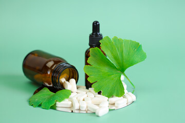  ginkgo biloba extract on green background.Preparations with ginkgo biloba extract.Alternative...
