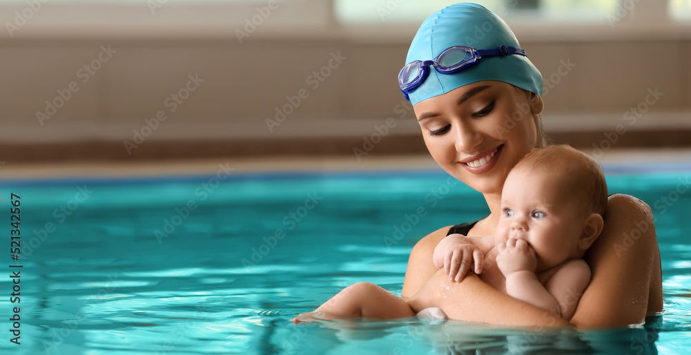 Wall mural swimming coach with funny baby in pool