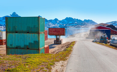 Forklift car working in container yard for preparing imported or exported products background - Tasiilaq - Greenland © muratart