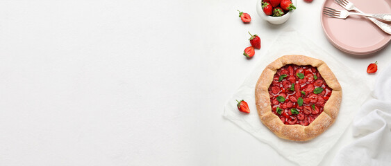 Composition with delicious strawberry galette on white background with space for text