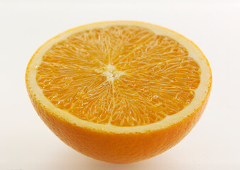 Half of orange isolated on white background.