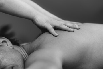 Massage for stress and tension relief. Female massage therapist massaging a woman