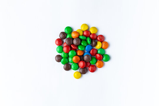 Zaporozhye Ukraine - July 10, 2022: milk chocolate candies m and m's on a light background