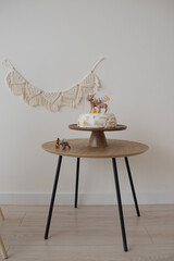 Birthday decoration in boho style with macrame elements © Lys Owl