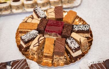 plate with homemade cakes at the wedding in Romania