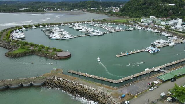 aerial drone view of Orbit in Pez Vela marine, Quepos, Costa Rica. 4K video of interesting places in central america.