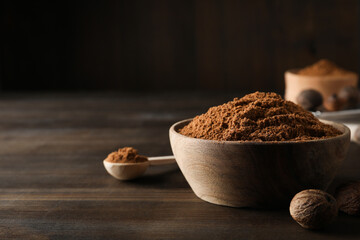 Concept of spices and condiments, nutmeg powder, space for text - obrazy, fototapety, plakaty