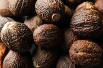 Concept of spices and condiments, nutmegs, close up