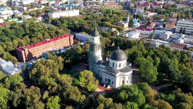 Aerial footage of Svyato-Troitsky cathedral and Central park on sunny summer day. Kaluga, Russia.