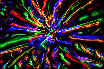 background of irregular colored lines running from the center