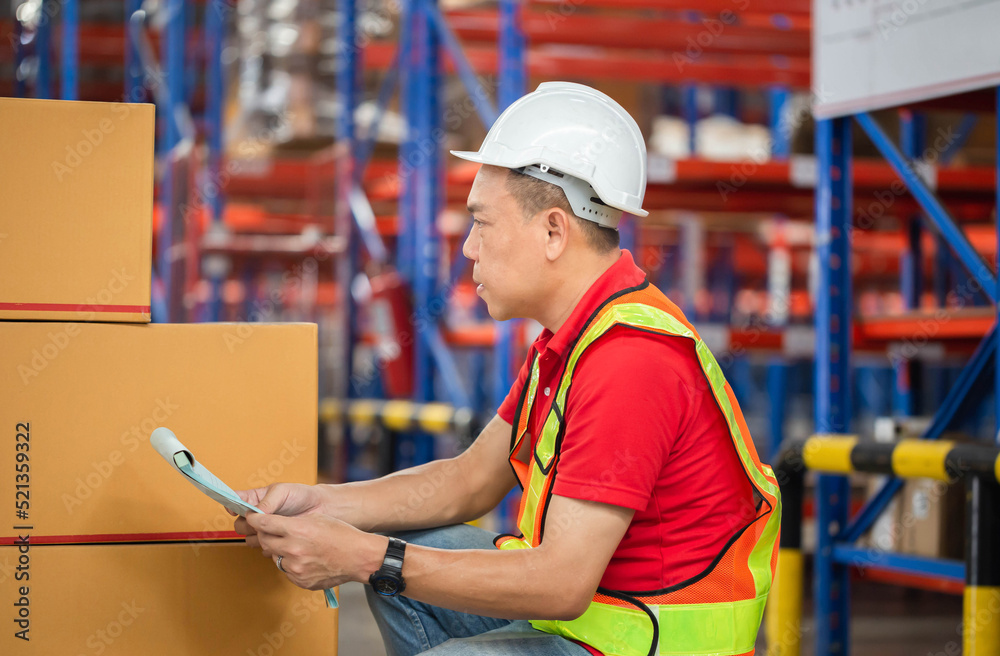 Wall mural Warehouse workers checking inventory, Forman worker working in factory warehouse