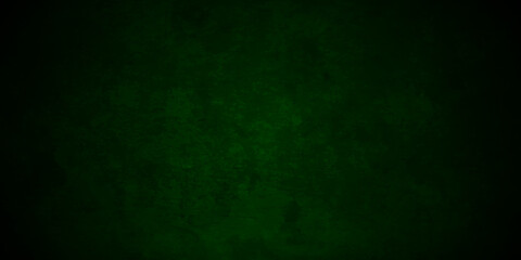 	
Backdrop Vintage green stone grunge concrete cement blackboard chalkboard wall floor texture. Black anthracite dark green grunge old texture panorama backdrop background.