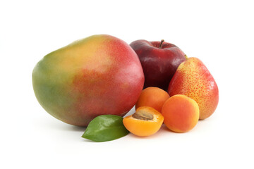 Whole and halved ripe apricot, pear and red apple
