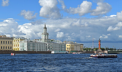 Fototapeta na wymiar Summer landscape with Neva river, University embankment and Kunstkamera building (Museum of Anthropology and Ethnography). Saint Petersburg