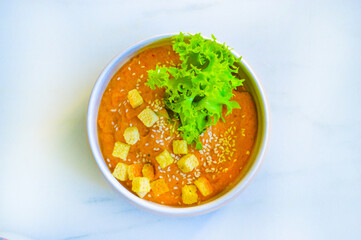 A homemade spicy soup with vegetables and croutons. Good for any project.