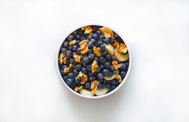 An oat cereal with blueberries, nuts and banana. Good for any project.