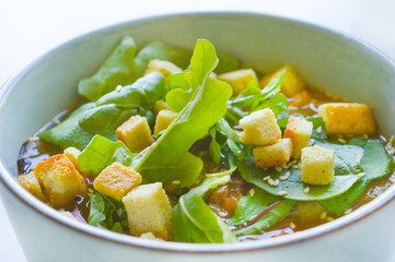 A homemade spicy soup with vegetables and croutons. Good for any project.