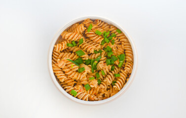 A homemade vegan pasta with greens and tomatoes. Good for any project.