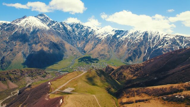 scenic drone shot of mountains in Kazbegi, Georgia. High quality photo