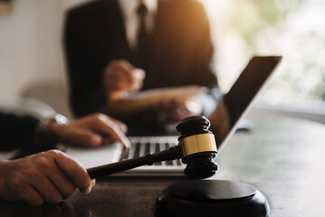 Lawyer or judge consult haveing team meeting at law office. Law and Legal services concept.