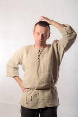 studio portrait of a pensive man in shirt