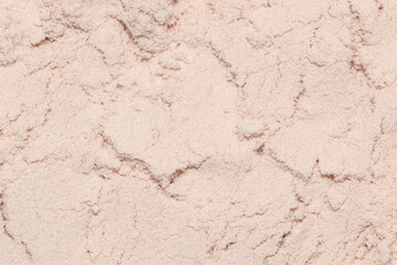 Mattifying loose powder in beige color for make up. 