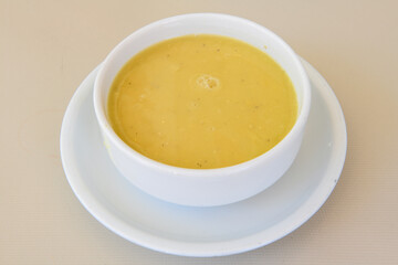 Lentil ( mercimek ) soup with melted butter and red pepper sauce