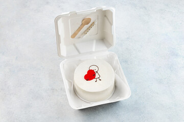 White cake for St. Valentine's Day, Mother's Day, or Birthday, decorated with  hearts on pink background