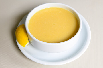 Lentil ( mercimek ) soup with melted butter and red pepper sauce