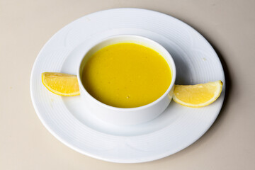 Lentil ( mercimek ) soup with melted butter and red pepper sauce
