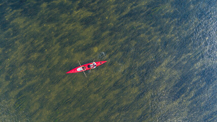 Kajak na rzece. 
Canoe on the river - obrazy, fototapety, plakaty