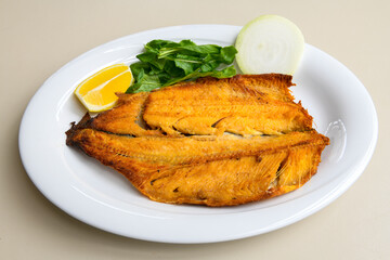 Grilled gilt-head bream ( Cipura IZgara )  with lemon. Top view.