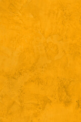 Saturated pastel orange colored low contrast Concrete textured background. Empty colourful wall texture with copy space for text overlay and mockups. 2023, 2024 color trend