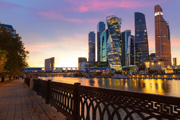 View of the Moscow International Business Center from the quay of Taras Shevchenko at sunset. Moscow, Russia - obrazy, fototapety, plakaty