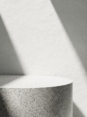 3d granite display podium with sunlight against white concrete wall. 3d rendering of realistic presentation for product advertising. interior illustration.