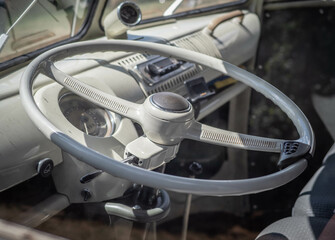 Dashboard and steering wheel of old-timer car