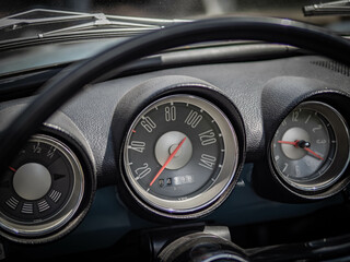 Dashboard and steering wheel of old-timer car