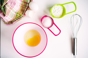 Baking background. Food ingredients for baking flour, eggs, sugar flat lay
