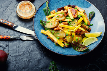 Fried chicken breast and mango