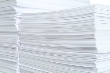 Stacks of white paper sheets, closeup view