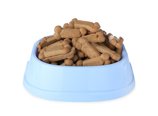 Bone shaped dog cookies in feeding bowl isolated on white