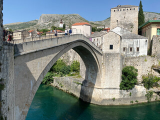 Fototapeta na wymiar old arched pedestrian bridge in Mostar Bosnia Europe
