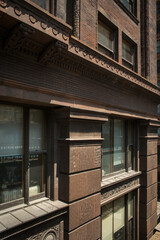 Architectonic masonry detail on a vintage building façade in Chicago 