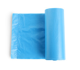 Roll of turquoise garbage bags on white background, top view. Cleaning supplies