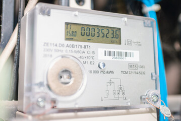 Smart electric power meter counter measuring power usage.Close-up of modern smart grid residential...