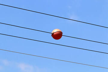 Electrical wires carrying high voltage current.