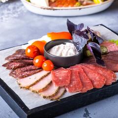 Wooden board with meat various. Meat appetizer