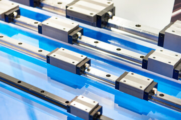 Linear steel rails for machines