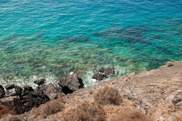 the turquoise and crystal clear water of Morro Jable, extreme meridonial tip of Fuerteventura
