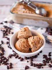 Coffee ice cream on rustic white table